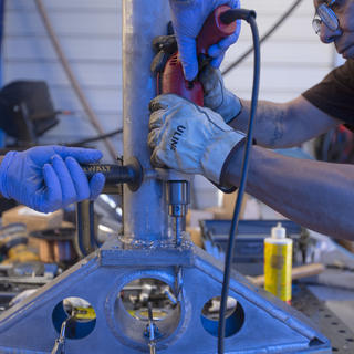 Close-up of drilling a saddle at our Innovation Campus in DTLA.